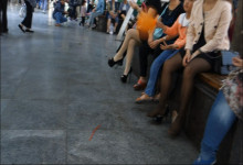Group of Woman Sat Chatting Then Play Their Shoes